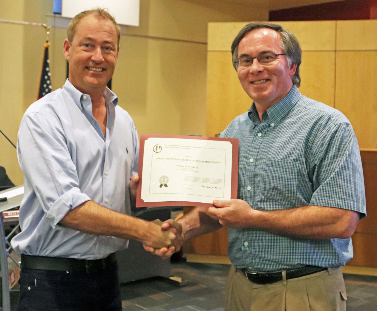 Robert McKie receives the Certificate of Excellence